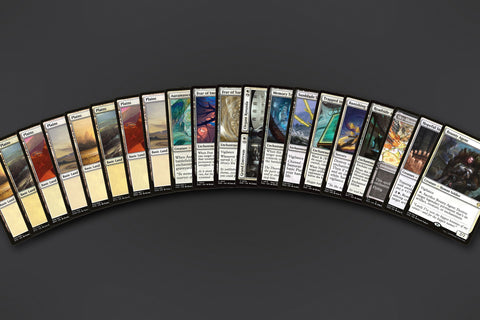 Representative sample of the White Enchantments MTG Repack: 20 cards fanned out, 8 Plains to the rare. Actual cards vary from pack to pack.